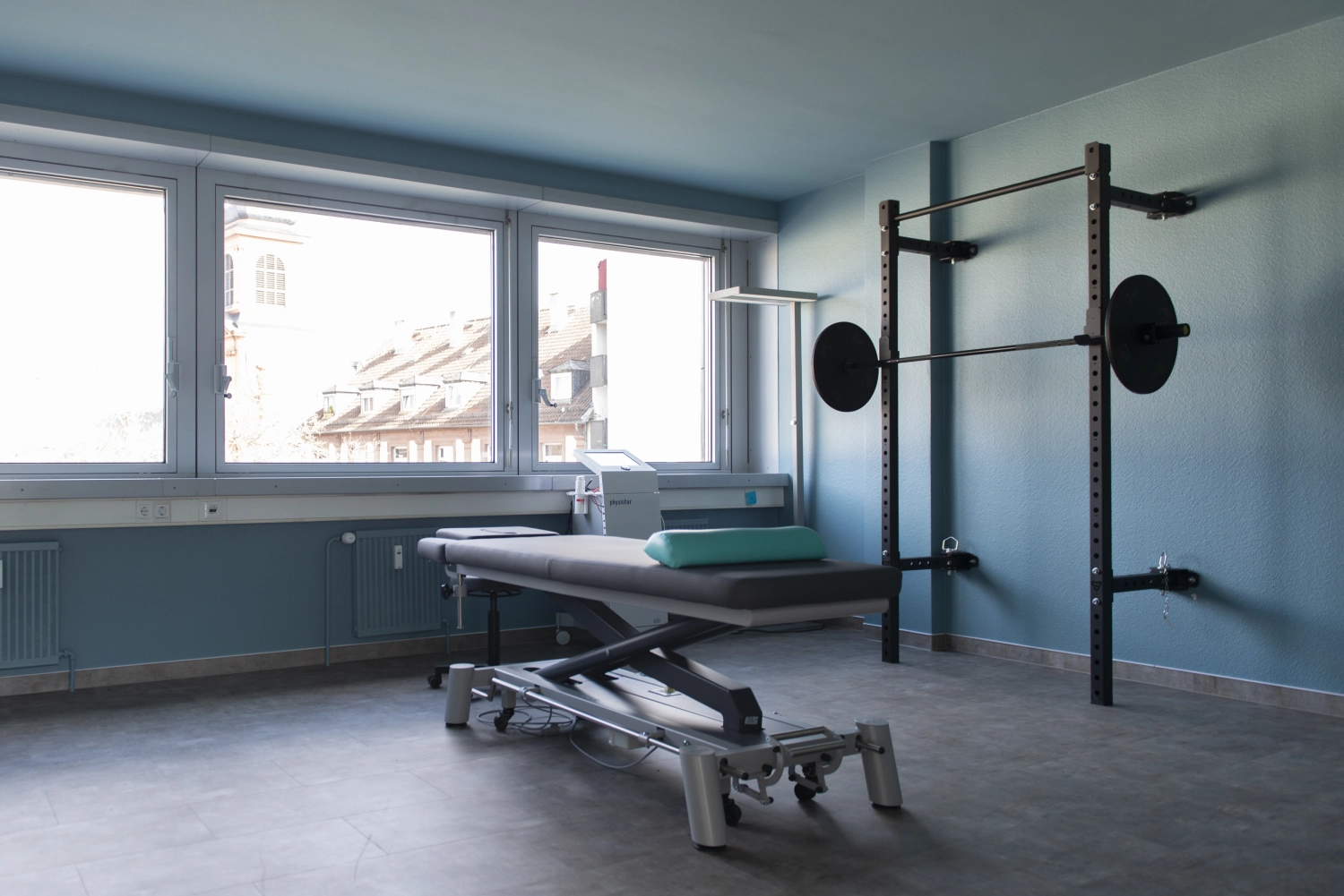 A Modern rehabilitation physiotherapy worker with senior client